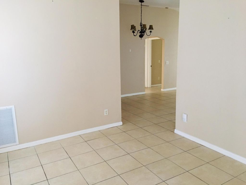 Photo of 1952 SW Hickock Ter, Port Saint Lucie, FL 34953 (MLS # R11159474)