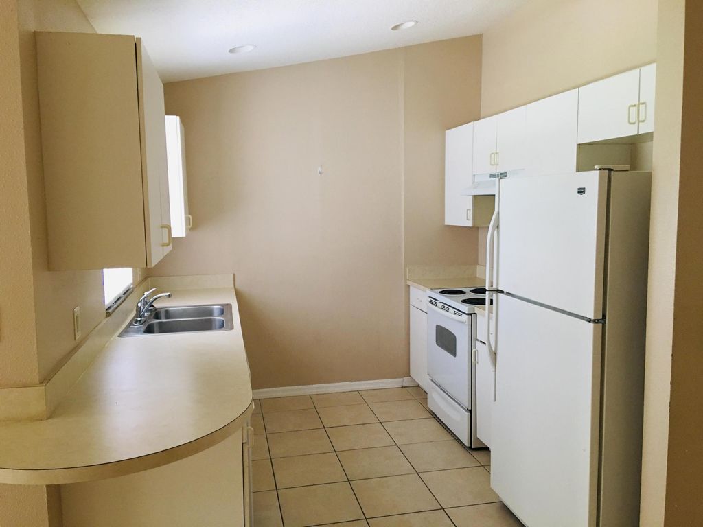 Photo of 1952 SW Hickock Ter, Port Saint Lucie, FL 34953 (MLS # R11159474)