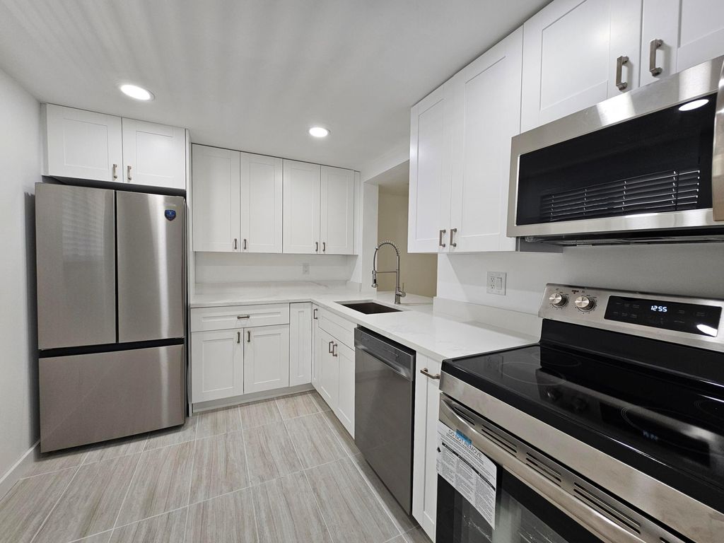 Photo of 5220 Las Verdes Circle #317, Delray Beach, FL 33484 (MLS # R11157005)