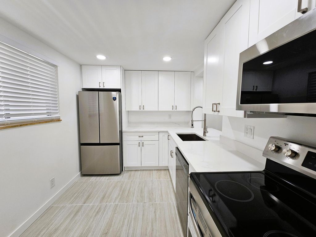 Photo of 5220 Las Verdes Circle #317, Delray Beach, FL 33484 (MLS # R11157005)