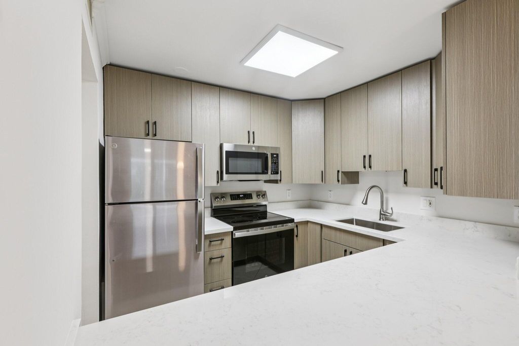 Photo of 3000 NE 5th Terrace #313-a, Wilton Manors, FL 33334 (MLS # B26011016)