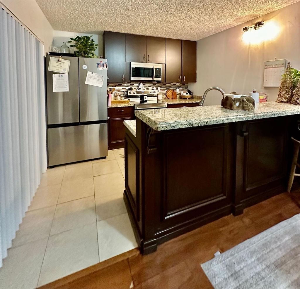 Photo of 2818 28th Lane, Greenacres, FL 33463 (MLS # R11145013)