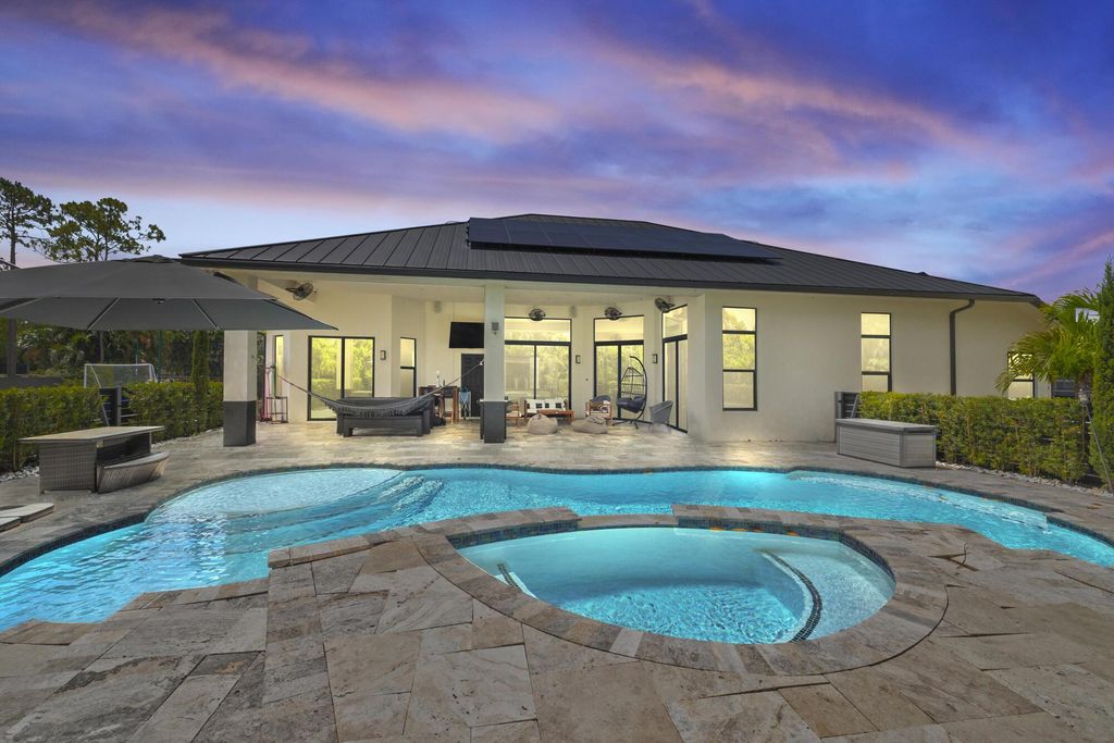 Photo of 13803 Citrus Grove Boulevard, West Palm Beach, FL 33412 (MLS # R11086772)