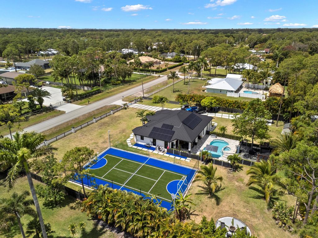 Photo of 13803 Citrus Grove Boulevard, West Palm Beach, FL 33412 (MLS # R11086772)