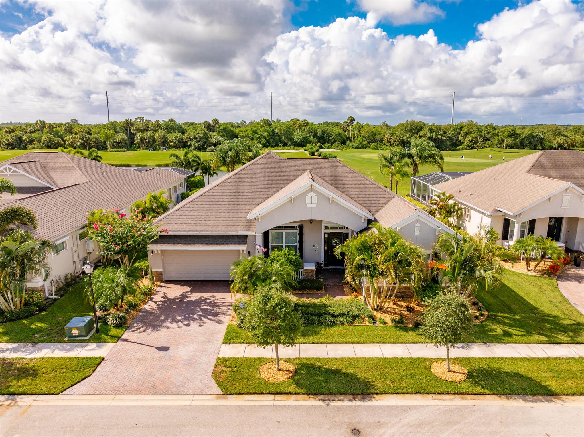 Remarkable 3/2.5/2 + den with a southern exposed screened in pool w/spa. This lot oversees the lake, hole #12 green and #13 tee box. This 2018 CBS is stylish and ready for its new owner. Showcasing a spacious kitchen with SS appliances, granite CT, enormous island and plenty of natural lighting. Primary suite has upgraded ceramic plank tile with custom walk-in closets and a renovated bathroom anyone would find amazing! Large covered porch with screened in lanai and perfectly located pool with views of all the action. Plus, ease of mind with Bahamian& accordion shutters + whole house generator