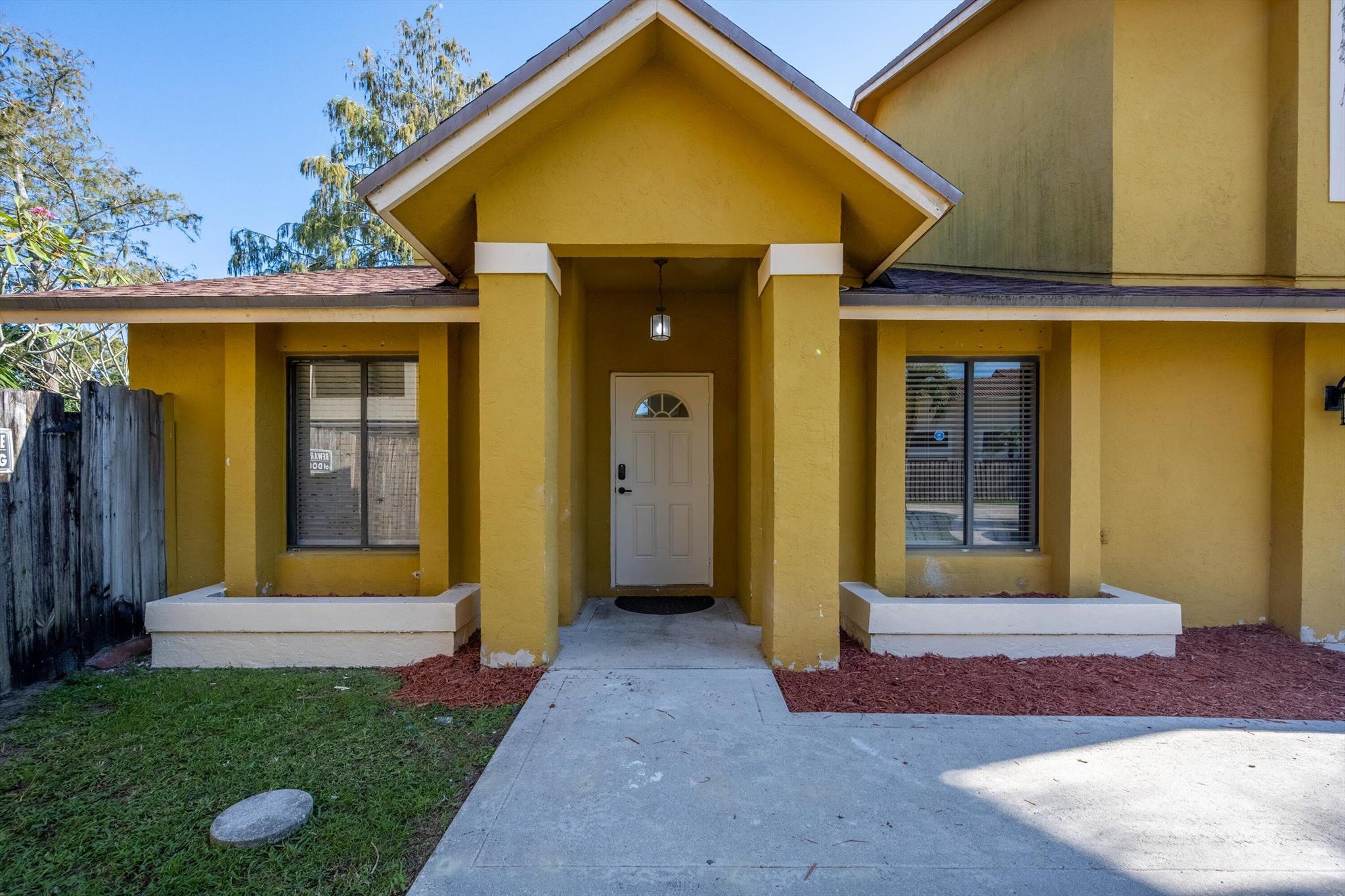 You cannot be closer to the show. Nicely renovated home, 2 stories with a very private primary suite. Fenced in back yard and patio, no restrictions on vehicles so bring your trucks.... park a care in the 1 car garage. Queen bed in primary, downstairs bedrooms 1 has a queen and 1 has a full. House next door is also available to rent