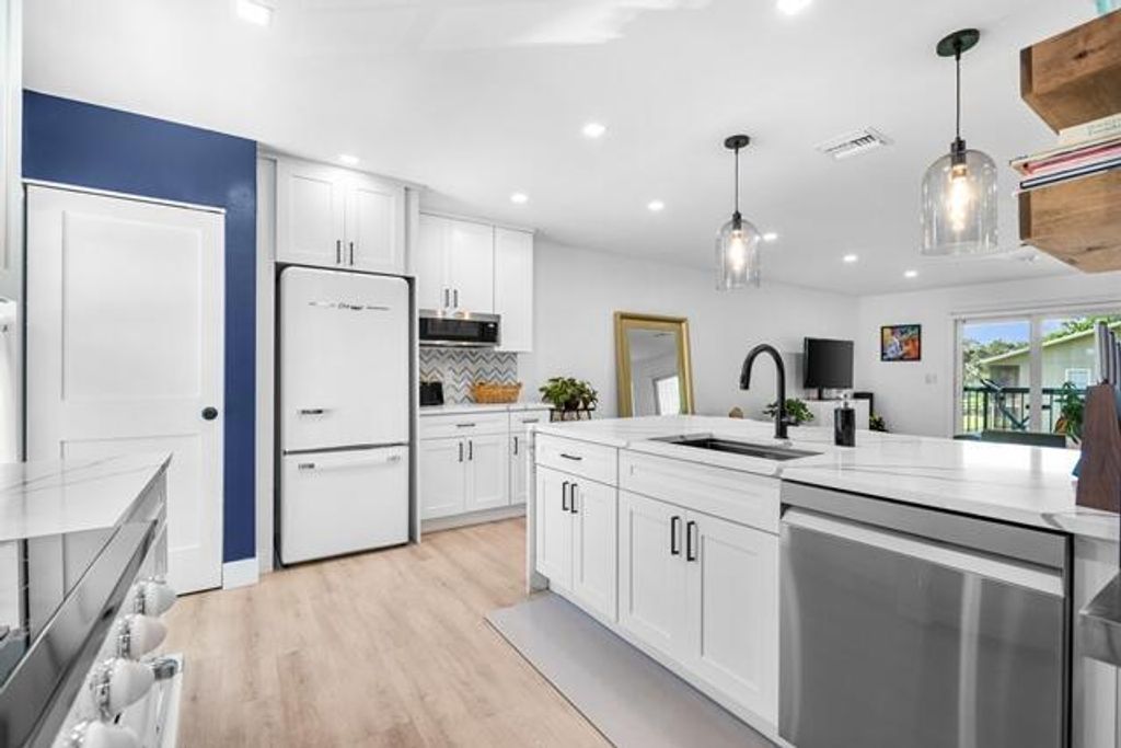 Photo of 18460 SE Wood Haven Lane #H, Jupiter, FL 33469 (MLS # B26006885)