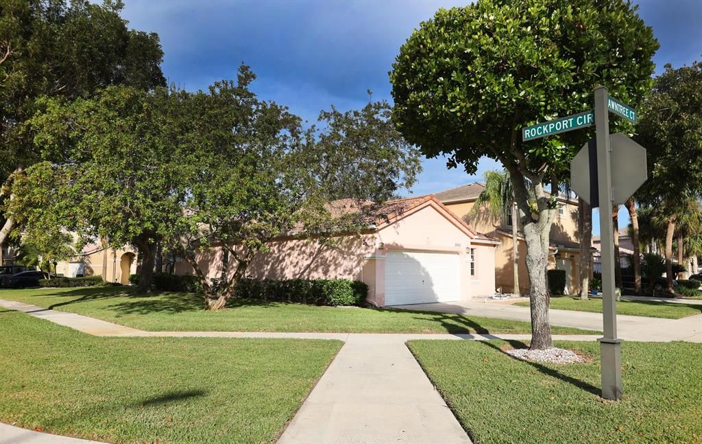 Photo of 6945 Dawntree Court Ct, Lake Worth Beach, FL 33467 (MLS # R10759910)