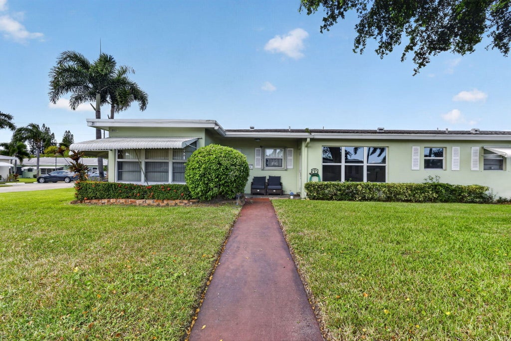 Photo of 211 COUNTRY Lane #A, Boynton Beach, FL 33435 (MLS # B26089044)
