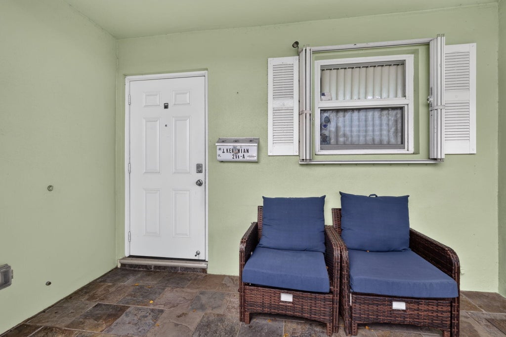 Photo of 211 COUNTRY Lane #A, Boynton Beach, FL 33435 (MLS # B26089044)
