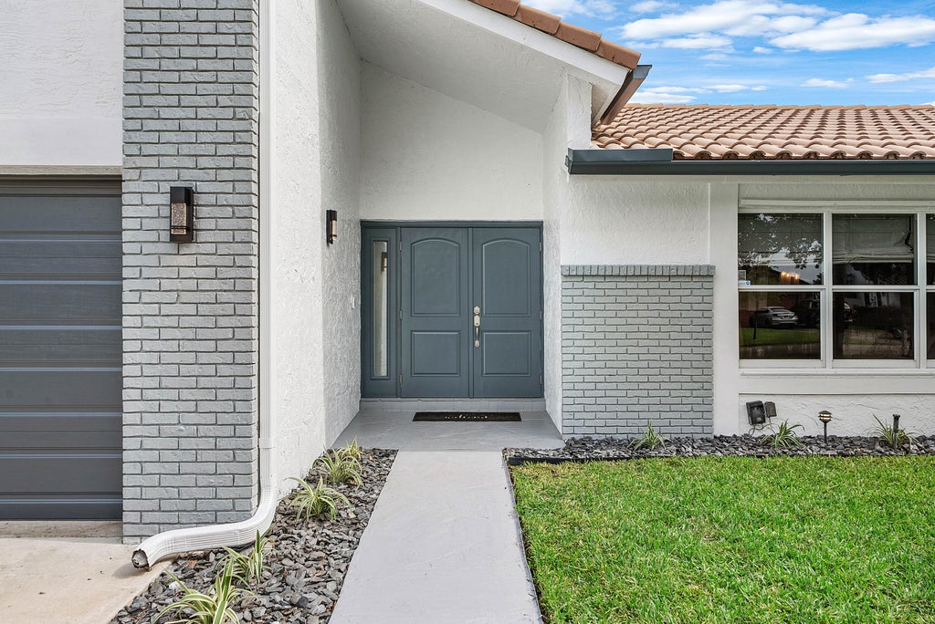 Photo of 10975 NW 19TH Street, Coral Springs, FL 33071 (MLS # B26078903)