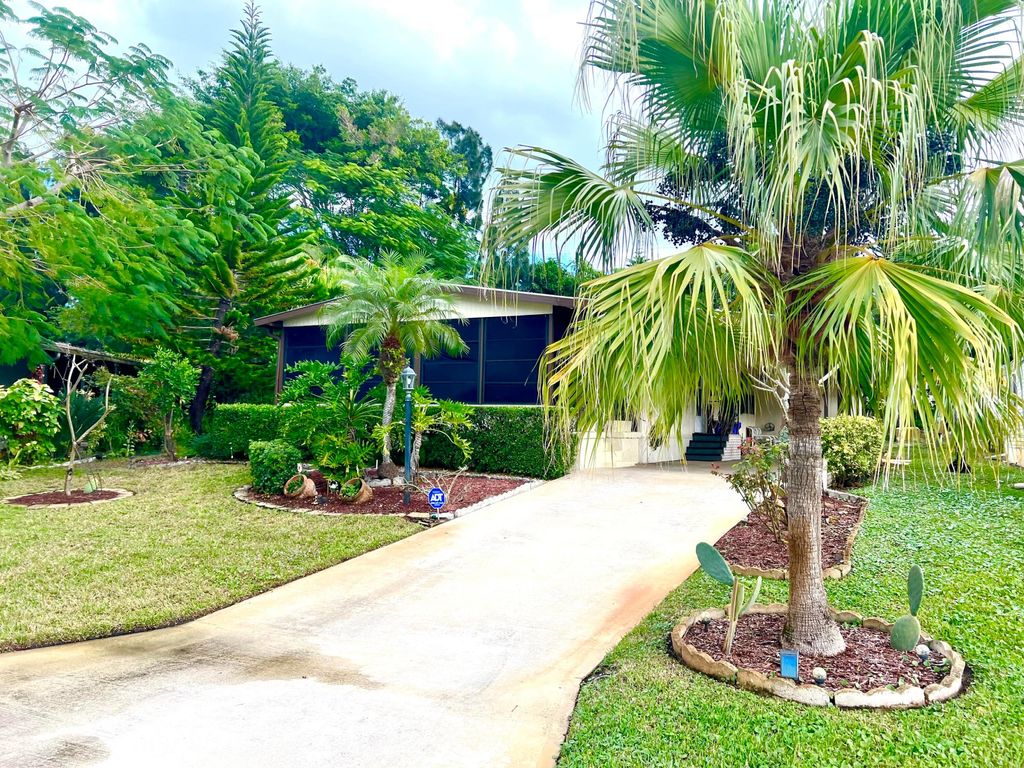 Photo of 8011 SE Homestead Avenue, Hobe Sound, FL 33455 (MLS # R11149402)