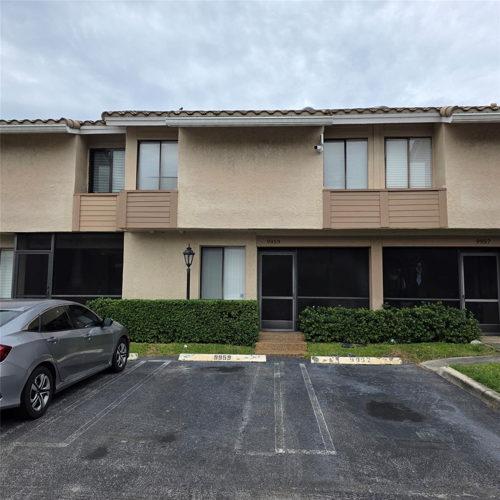 Photo of 9959 W Atlantic Blvd, Coral Springs, FL 33071 (MLS # F10535265)