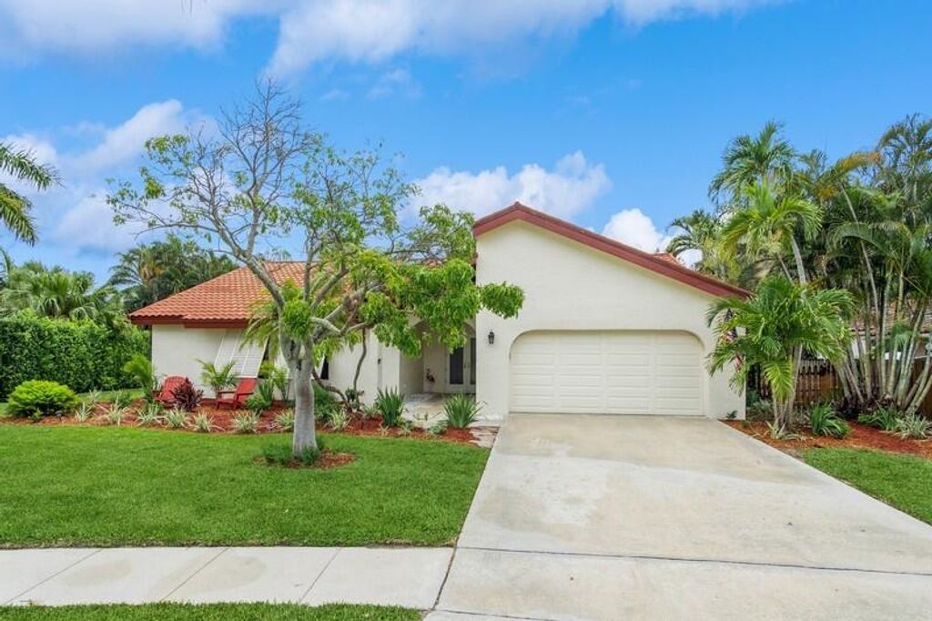 Photo of 403 NW 72 Street, Boca Raton, FL 33487 (MLS # R11097767)