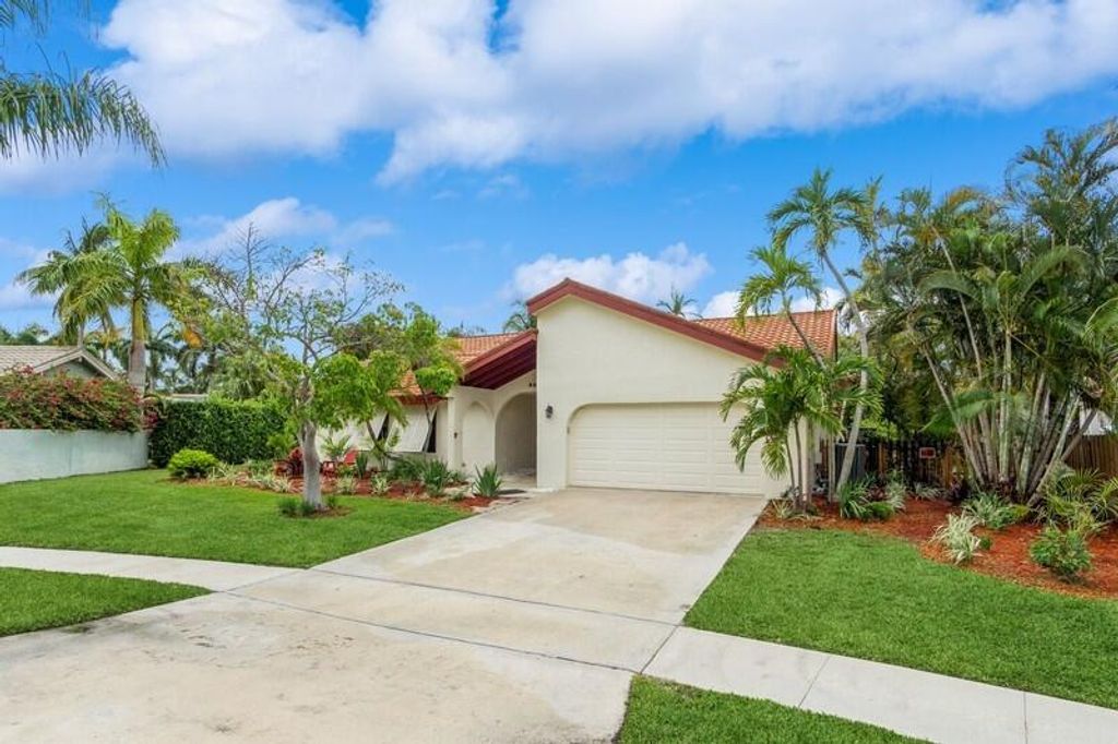 Photo of 403 NW 72 Street, Boca Raton, FL 33487 (MLS # R11097767)