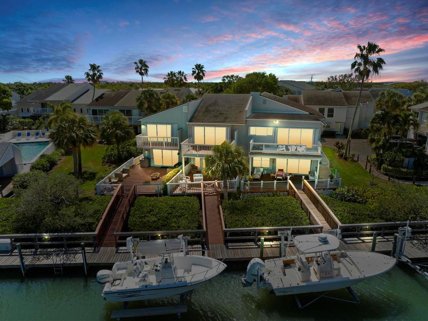 Island waterfront paradise and boaters delight! Rare rare find! Bring your sailboat or power boat and park it at your deeded deep-water boat slip.   One of Florida's finest inlets is just minutes away providing the ultimate location for deep sea fishing or taking a leisurely cruise on the intracoastal waterway.
There's more...! Enjoy relaxing on your spacious outdoor deck overlooking the water and view the spectacular sunsets whilst relaxing with friends/family .   
Community also has a  private beach with picnic area and kayak storage.  
This beautiful home offers a bright, open design perfect for entertaining. Features include: sparkling white kitchen cabinetry topped with granite, glass display , custom pullouts an mosaic tile insets in great room and entry.
Don't tarry on this one! At time of listing, the only one for sale in Harbour Cove!  Opportunity is knocking. Owner is motivated!