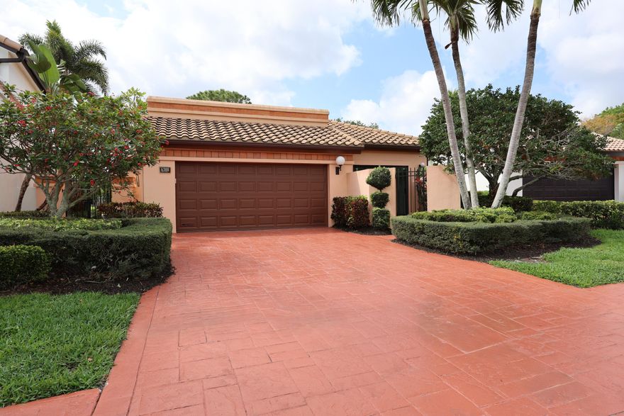 BEAUTIFUL extensively renovated 3-bedroom, 2-bath home located in the desirable Villa Flora enclave of Boca Pointe, a guard-gated community with optional country club membership. This residence has been thoughtfully upgraded throughout. The interior features beautiful wood flooring across the main living areas, while the permitted enclosed sunroom adds approximately 180 sq ft of additional living space, providing a bright and versatile area. The fully remodeled kitchen includes new cabinetry and new appliances. Both bathrooms have been completely renovated with elegant tile work, and the spacious primary bathroom features a large curbless walk-in shower designed for both style and accessibility, along with a removable drain cover for convenient cleaning. Additional upgrades... ...include Impact windows throughout and impact garage door (insurance benefit), EXTENDED Master Bedroom, New solid wood interior doors with updated hardware throughout, a new 5-ton Daikin A/C system, new water heater, Recessed lighting, New electrical panel, Structured media panel with full-house pre-wiring for internet, audio, and smart home connectivity, New flat deck ceiling with lifetime warranty. The outdoor area has been redesigned for easy maintenance and enjoyment, with the previous pool removed to create a spacious backyard with new turf and additional outdoor living space. Villa Flora offers residents a beautifully maintained, private environment within the highly sought-after Boca Pointe community, conveniently located near top dining, shopping, golf, and South Florida beaches.