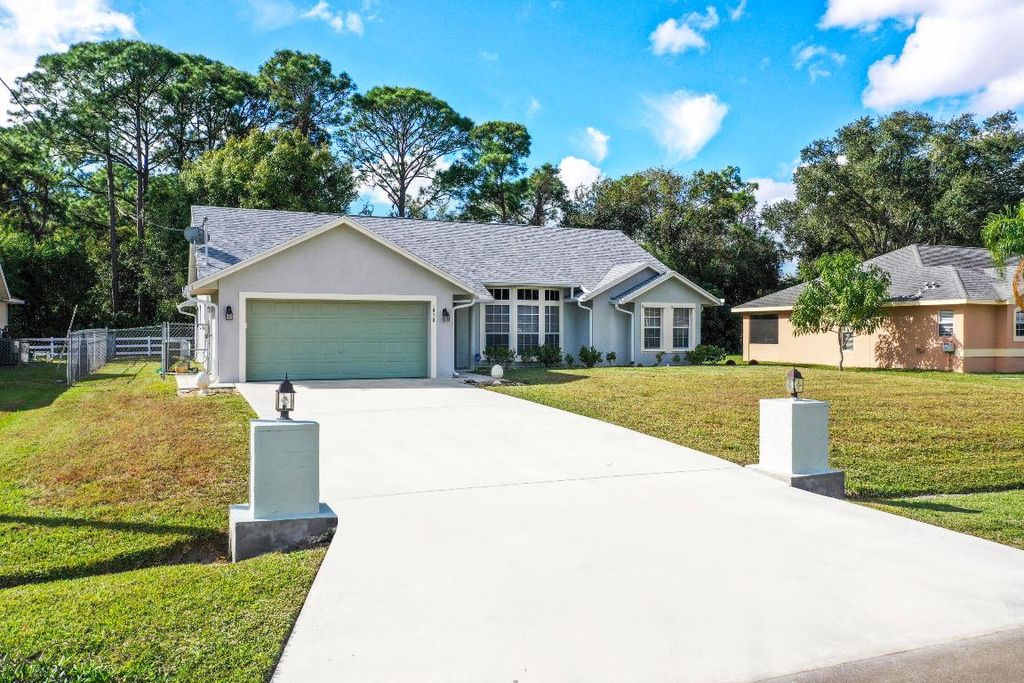 Photo of 1858 SW Leafy Road, Port Saint Lucie, FL 34953 (MLS # R11148811)