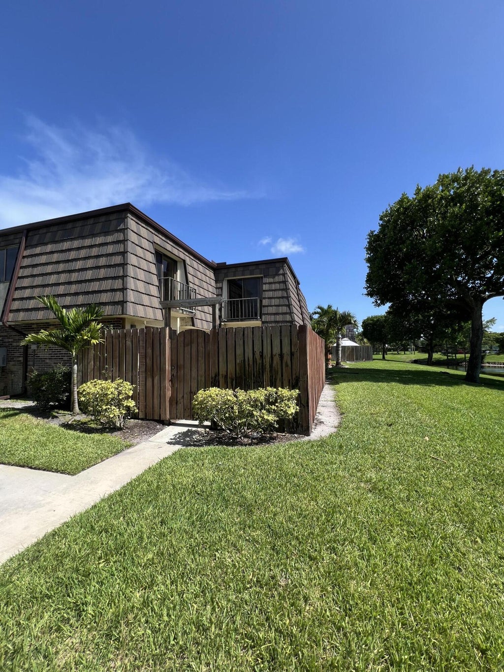 Photo of 1565 Forest Lakes Circle #D, West Palm Beach, FL 33406 (MLS # R11001262)