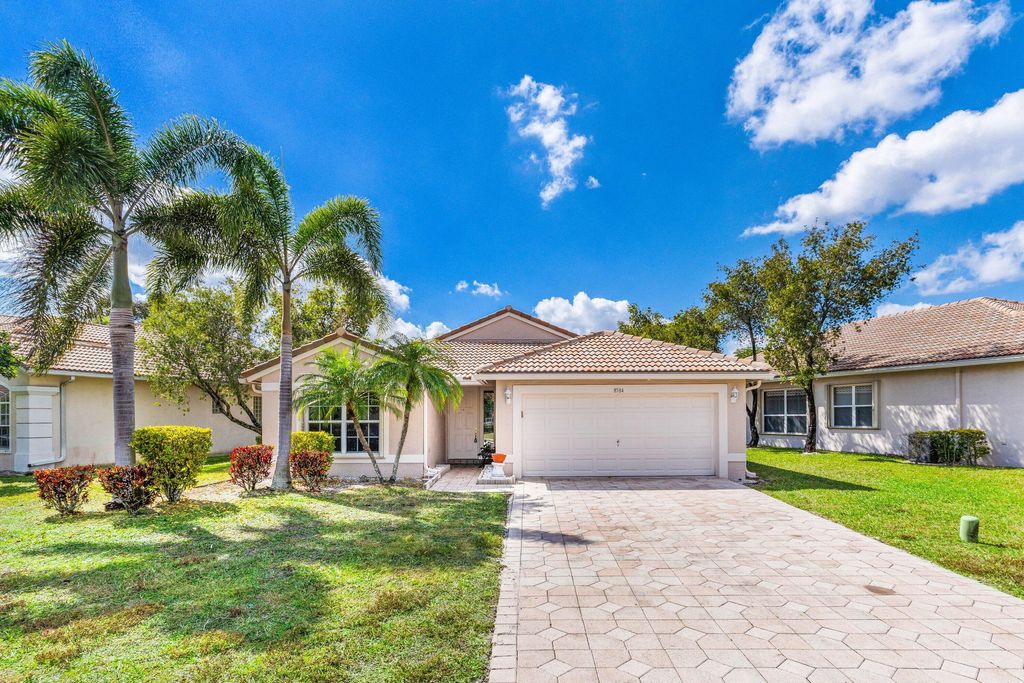 Photo of 8584 San Andros, West Palm Beach, FL 33411 (MLS # R11164619)