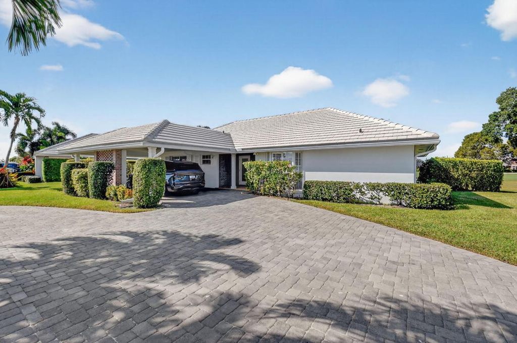 Photo of 355 Villa Drive S, Atlantis, FL 33462 (MLS # R11136654)