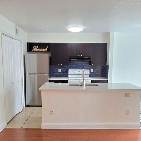 Tiny photo for 977 Riverside Drive #220, Coral Springs, FL 33071 (MLS # R11153309)