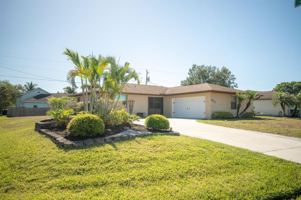 Photo of 1901 SW Ember Street, Port Saint Lucie, FL 34953 (MLS # R10980359)