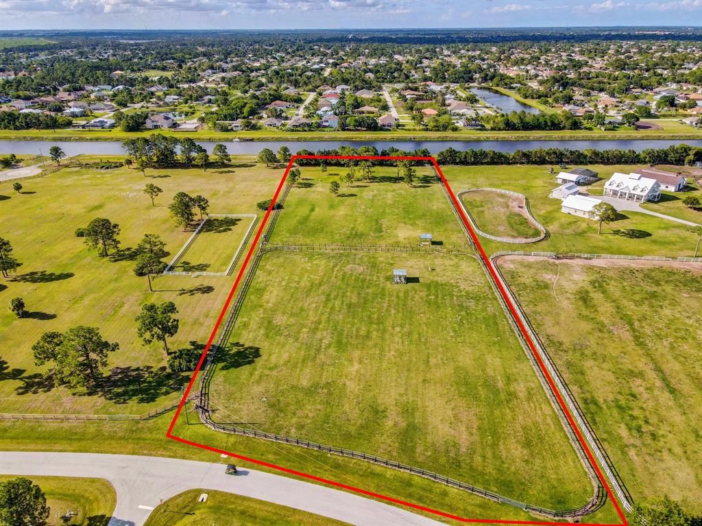 Photo of 9722 SW Santa Monica Drive, Palm City, FL 34990 (MLS # R10711381)