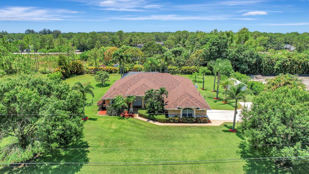 Photo of 12684 70th Place N, The Acreage, FL 33412 (MLS # R11021905)