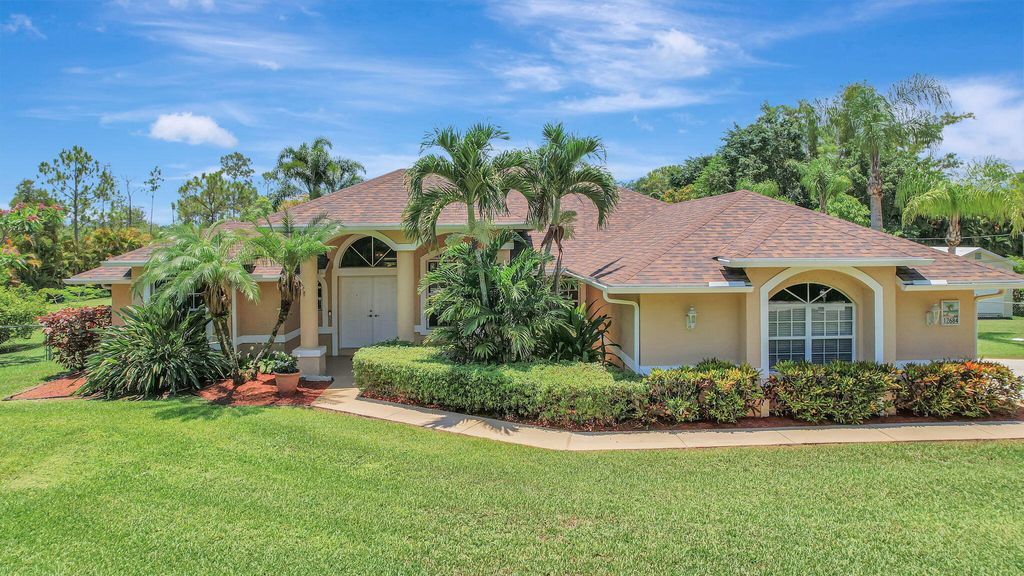 Photo of 12684 70th Place N, The Acreage, FL 33412 (MLS # R11021905)