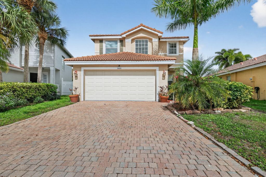 Photo of 5033 Polaris Cove, Greenacres, FL 33463 (MLS # B26001125)