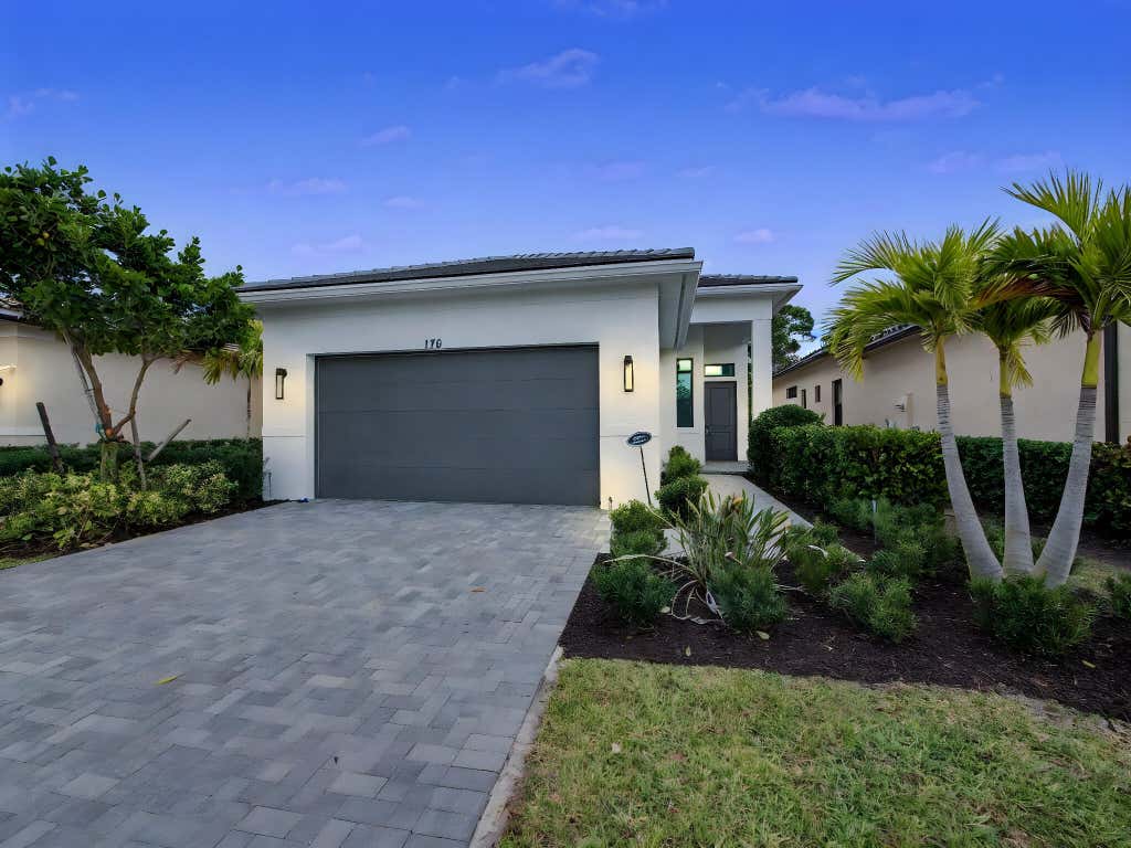 Photo of 176 SE Via Sangro, Port Saint Lucie, FL 34952 (MLS # B26045640)