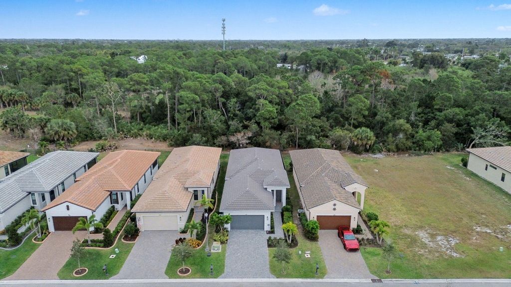 Photo of 176 SE Via Sangro, Port Saint Lucie, FL 34952 (MLS # B26045640)