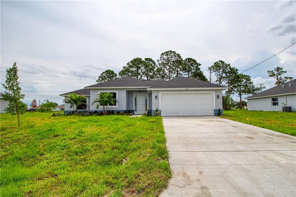Photo of 4583 SW Bradbury St, Port St Lucie, FL 34953 (MLS # F10420557)