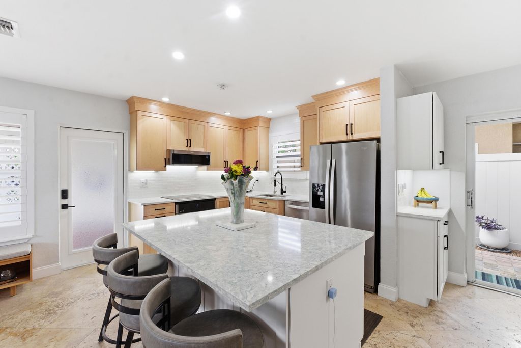 Photo of 1436 NE 38th Street, Oakland Park, FL 33334 (MLS # B26017305)