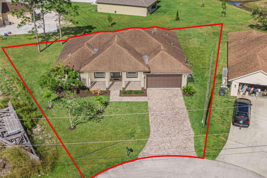 Photo of 5834 NW Lomb Court, Port Saint Lucie, FL 34986 (MLS # R10934752)