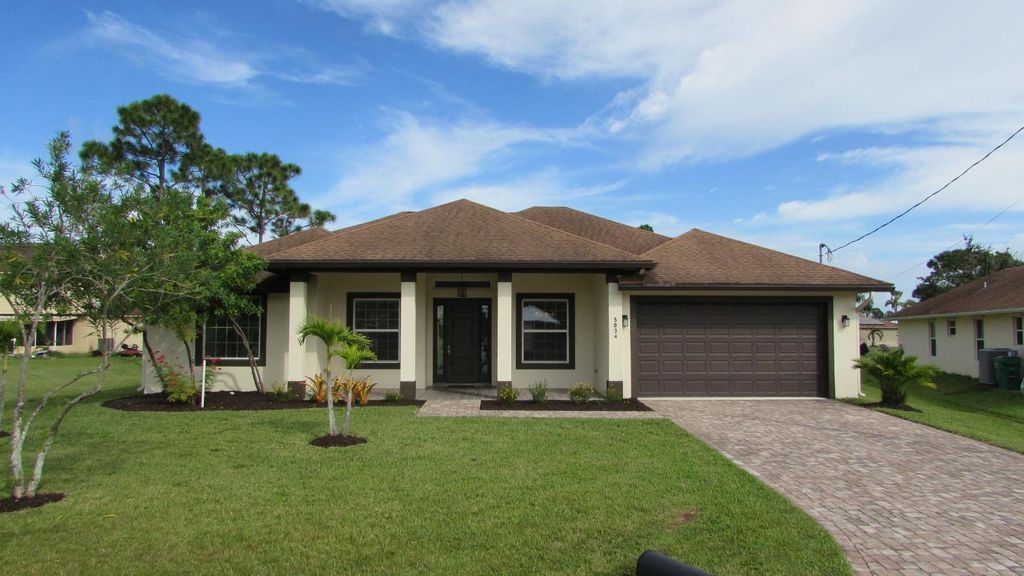 Photo of 5834 NW Lomb Court, Port Saint Lucie, FL 34986 (MLS # R10934752)