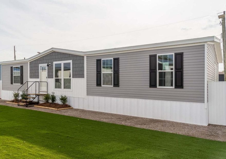 Brand New 3BR/2BA Home on 1.25 Acres in the Prairie/Viking area -This beautifully upgraded 1,493 SqFt Champion Embrace home features a modern split floor plan with warm wood tones, accent walls, and stylish contemporary finishes throughout. The spacious kitchen includes a large island, built-in microwave, coffee bar, and contrasting countertops. A dedicated dining area flows into the inviting living room, creating an open and comfortable space for everyday living. The private primary suite offers a relaxing retreat with a standalone soaking tub, oversized shower, and double vanity. Additional highlights include finished drywall throughout, stainless steel appliances, black fixtures, walk-in closets, and an interior laundry room with built-in cabinets and hanging rack. Situated on a 1.25-acre AG-zoned lot, this property provides plenty of room for animals, RVs, boats, or future additions like a barn, garage, workshop, or pool. Conveniently located just a short drive from Lake Okeechobee and the City of Okeechobee for shopping, dining, and medical services. Financing options available! This home qualifies for FHA, VA, Conventional, USDA, and Non-QM lending, including programs with low down payment and no income verification options for qualified buyers. Ask about special financing options and lender incentives
