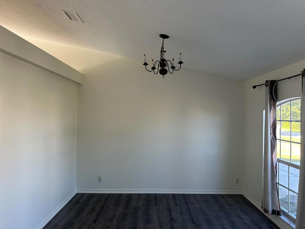 Photo of 932 SW Mcelroy Avenue, Port Saint Lucie, FL 34953 (MLS # R11039373)