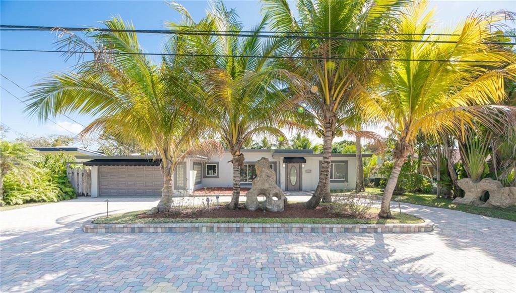 Photo of 1712 NE 18th Ave, Fort Lauderdale, FL 33305 (MLS # F10319760)