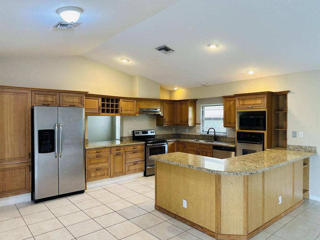 Photo of 6040 NW 60th Avenue, Parkland, FL 33067 (MLS # R10936218)