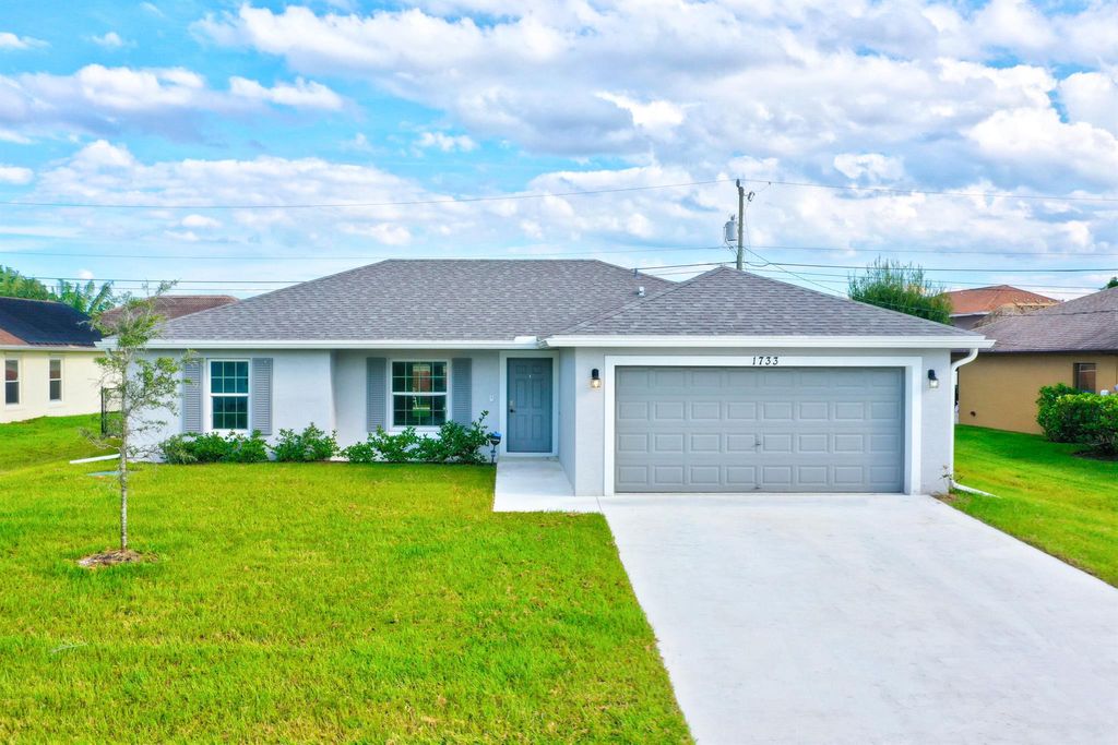 Photo of 1733 SW Columbia Street, Port Saint Lucie, FL 34987 (MLS # R11123721)