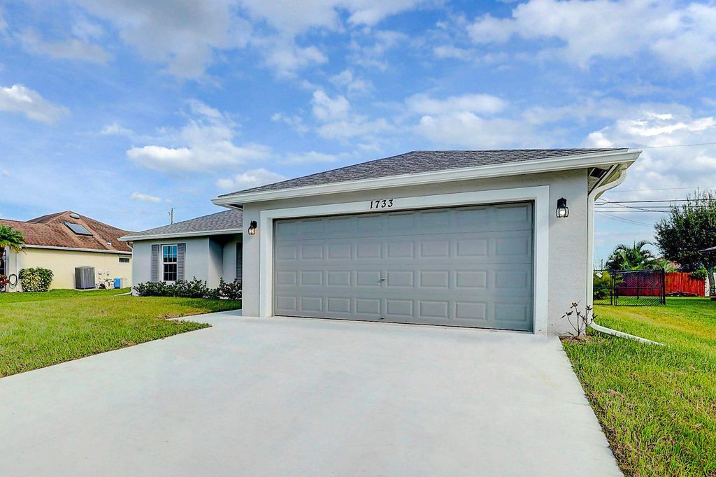 Photo of 1733 SW Columbia Street, Port Saint Lucie, FL 34987 (MLS # R11123721)