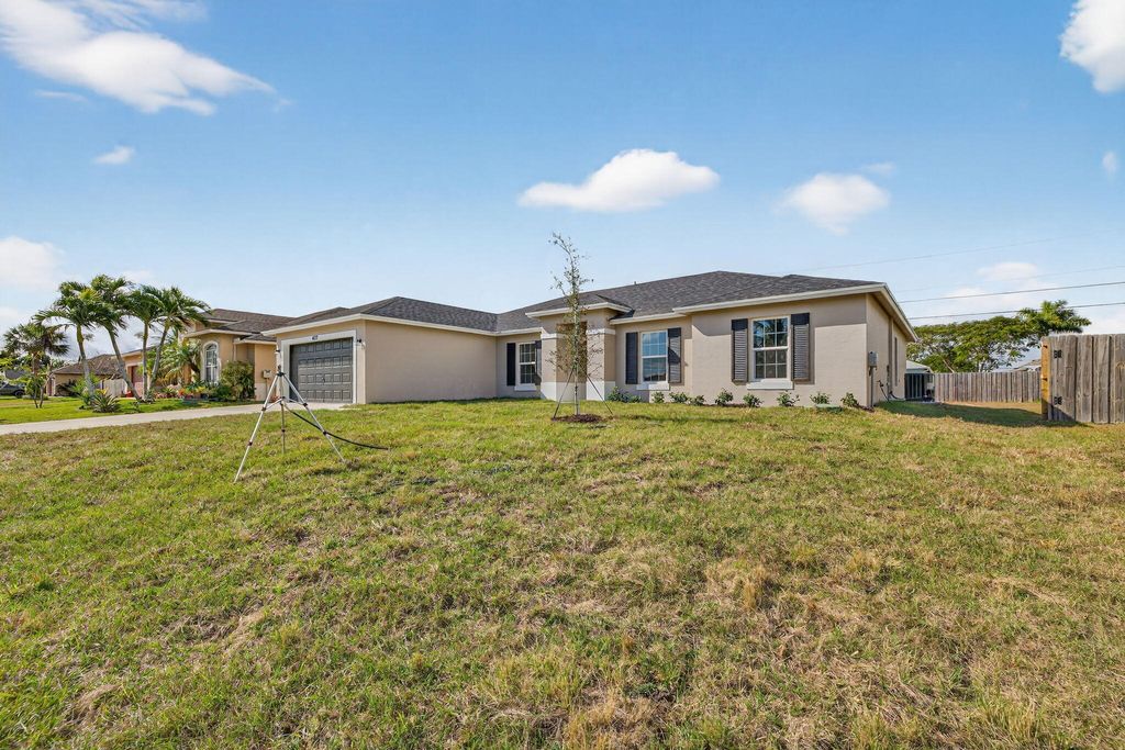 Photo of 4122 SW Baird Street, Port Saint Lucie, FL 34953 (MLS # R11144136)