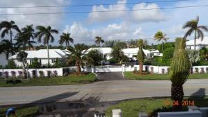 This unit is located on the 2nd floor on the west side of the property. Slight view of the Lake Worth Lagoon from Dining Room, Living Room & Patio. Recently renovated. Access is by a 24 hr. Manned gates. The La Coquille Club is available to all residents and provides access to all facilities at the adjoining Eau Palm Beach Resort and Spa. La Coquille offers full services to the owners including a private beach and pool.