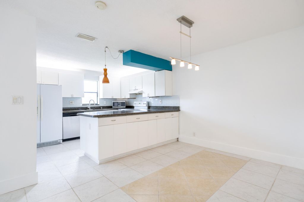 Photo of 9460 SW 61st Way #A, Boca Raton, FL 33428 (MLS # B26019317)