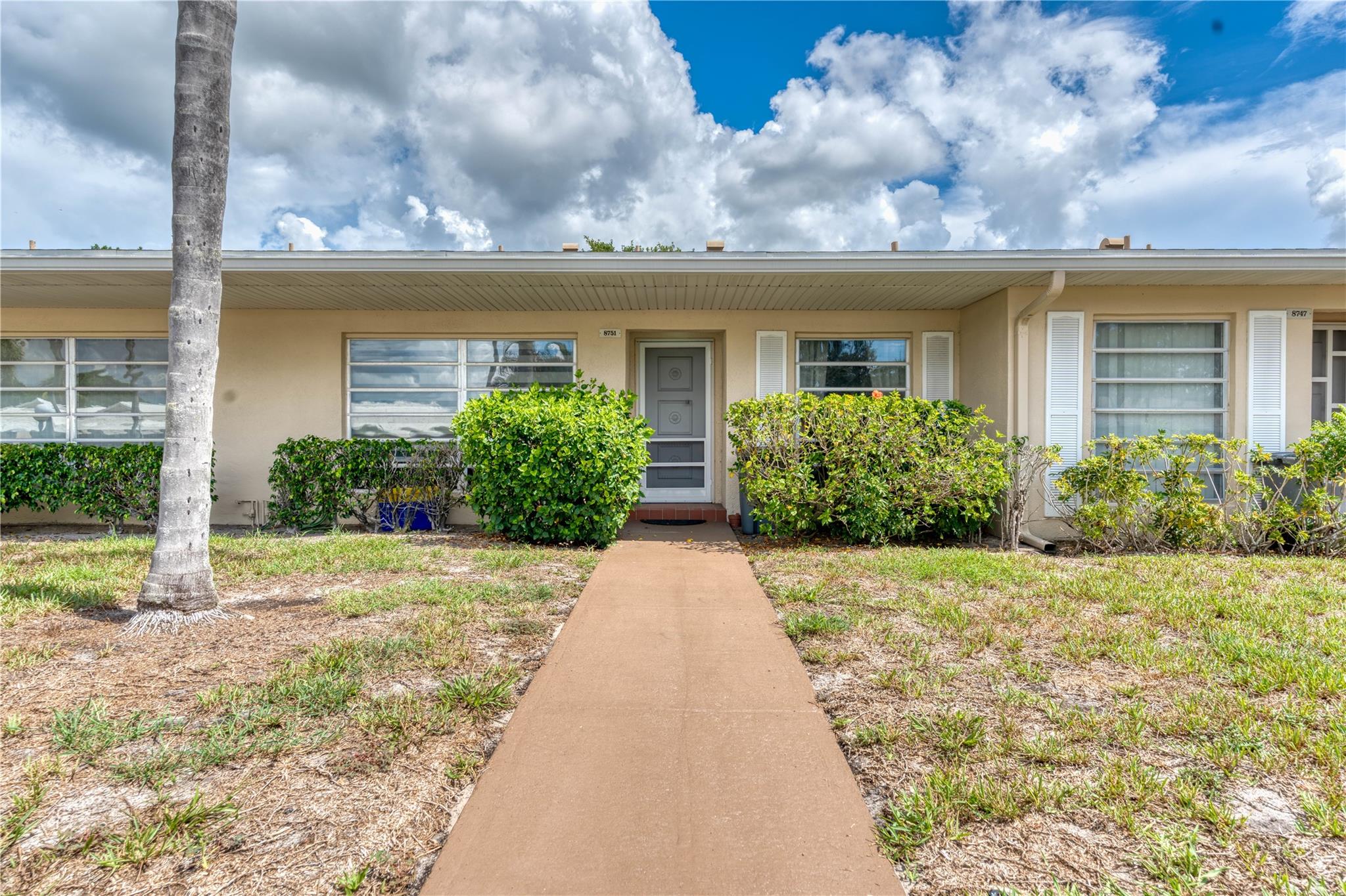 Welcome to this beautifully renovated unit in the highly desirable 55+ community of Boca Lakes. This charming property features elegant porcelain floors throughout and a brand-new A/C system installed in 2021, ensuring year-round comfort. The roof was also replaced in 2021, offering peace of mind for years to come. Enjoy your mornings or evenings on the private patio, perfect for relaxing or entertaining. Located just across the street from the community pool and tennis courts, this home offers unbeatable convenience and amenities right at your doorstep. Boca Lakes is a vibrant, well-maintained community ideally situated near top-rated shops, restaurants, and everything Boca Raton has to offer. Don’t miss your chance to own a turnkey home in one of the area's most welcoming neighborhoods!