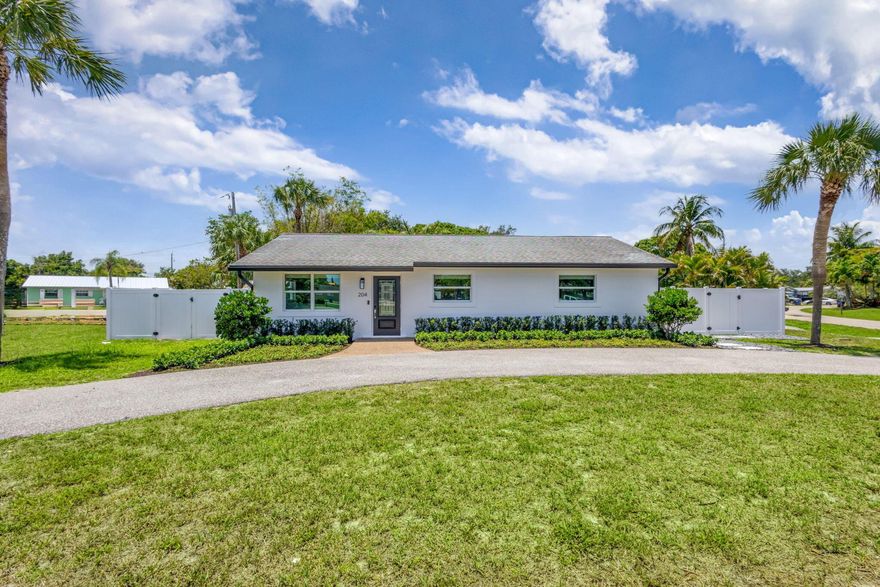 Beautifully remodeled 3 bedroom 2 bathroom home in the heart of Jupiter that features an open floor plan, natural light, fresh interior and exterior paint, and new gutters. Enjoy the brand new fenced in backyard with updated landscape, Adirondack chairs, new, low maintenance turf as well as a large open front yard. A SimpliSafe alarm system is installed and ready to activate. Located in a quiet neighborhood with easy access to I-95 and just a few minutes to the beach, shopping, dining and all that Jupiter has to offer.