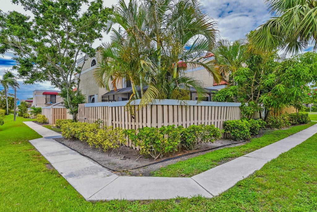 Photo of 3640 Village Drive #A, Delray Beach, FL 33445 (MLS # B26041832)