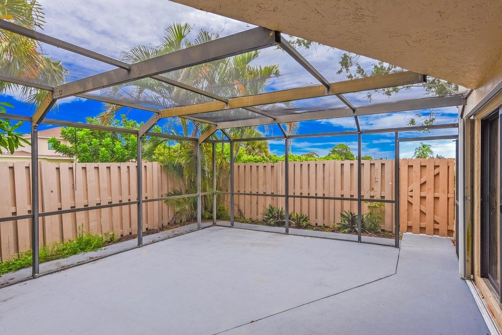 Photo of 3640 Village Drive #A, Delray Beach, FL 33445 (MLS # B26041832)